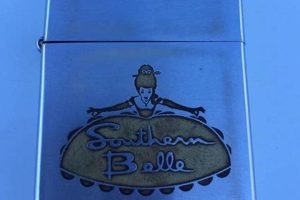 The Southern Belle's Gold Zippo: A Story of Style & Fire |